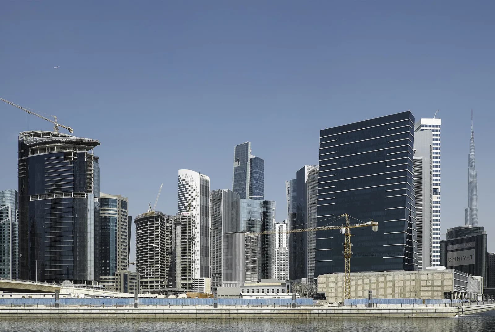 Business Bay street level with the Burj Khalifa in the distance
