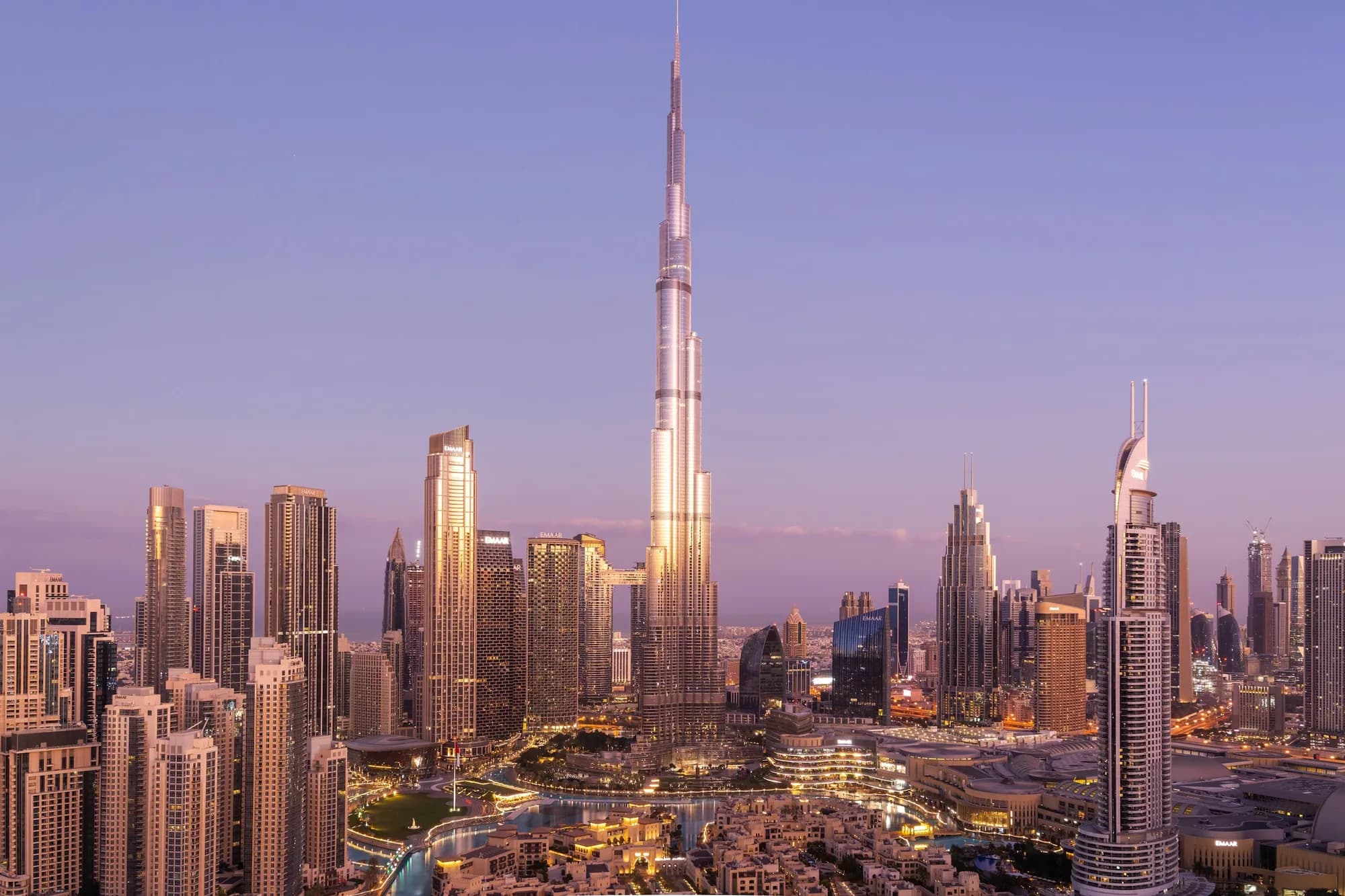 Downtown Dubai skyline at dusk with the Burj Khalifa and Burj Park