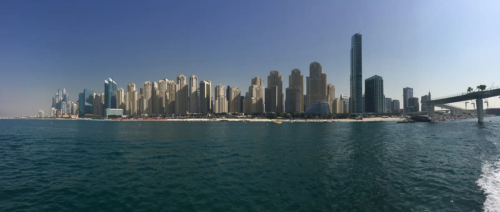 Wide view of the Dubai Marina skyline from the sea