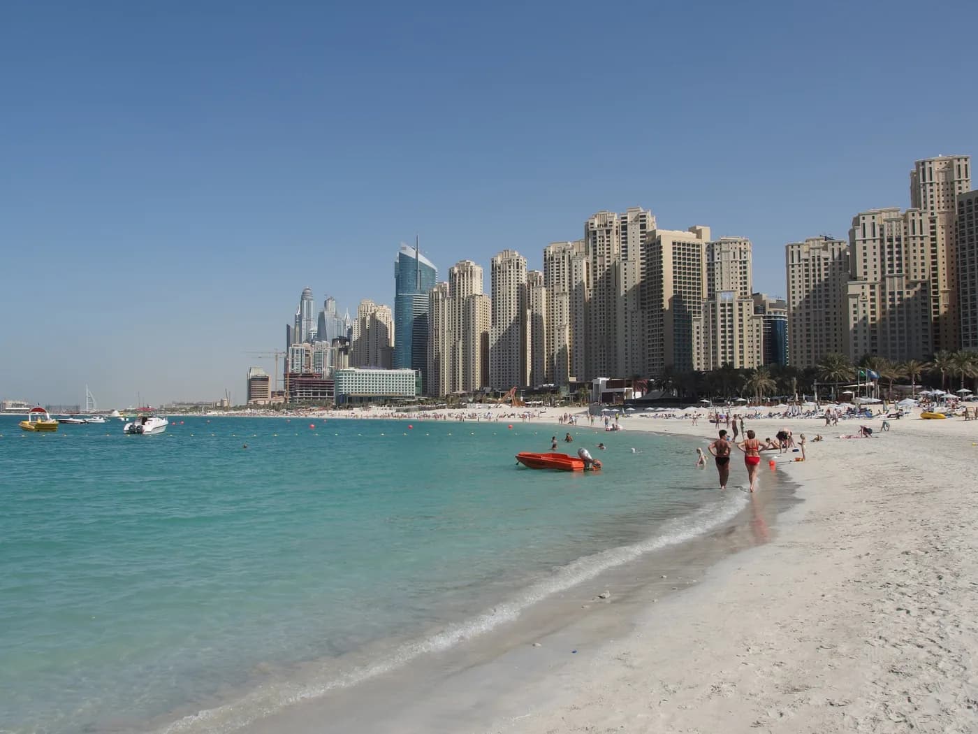 Jumeirah Beach Residence beach with turquoise water and towers behind